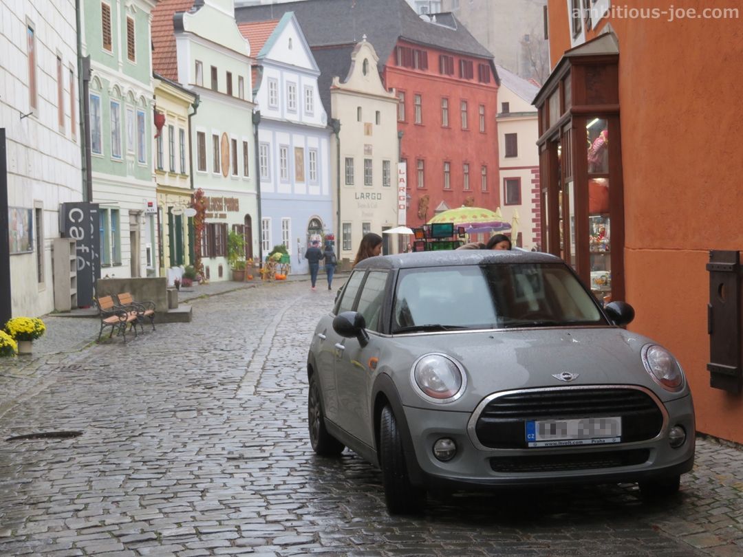 Český Krumlov rainy street and mini cooper